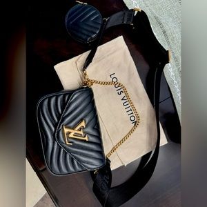 Louis Vuitton black satchel. Worn only three times.